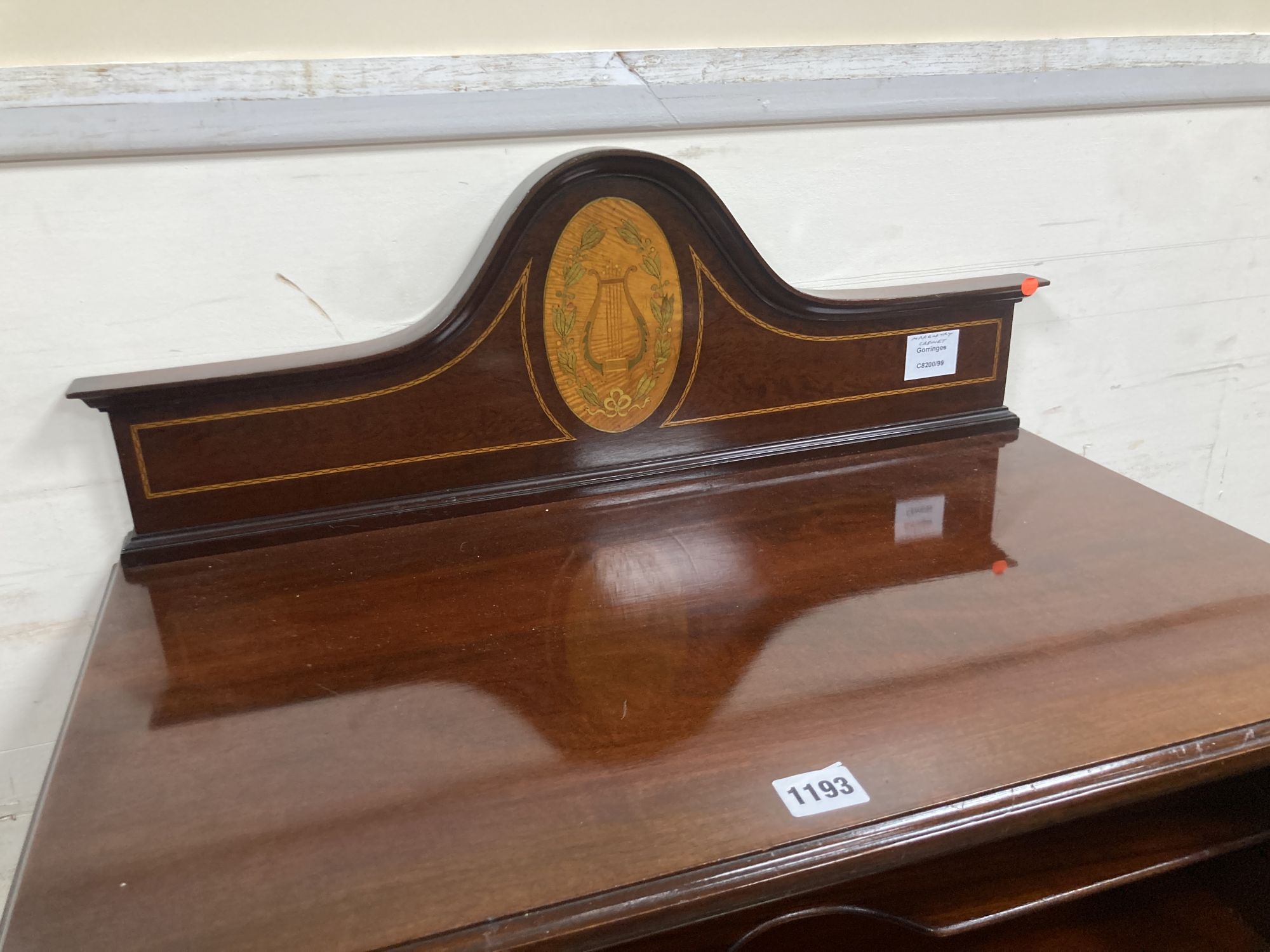 A Sheraton revival mahogany and marquetry music cabinet (later stand?), width 64cm, depth 37cm, height 130cm